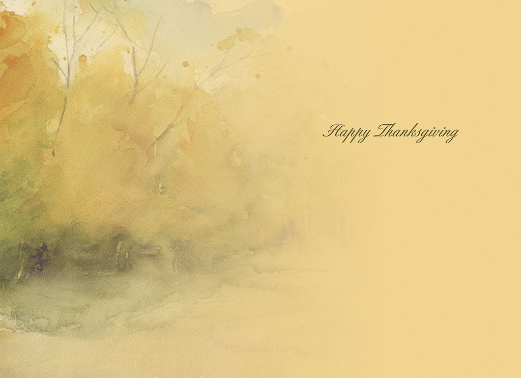 Inside of a Thanksgiving greeting card with soft watercolor autumn trees and 'Happy Thanksgiving' message.