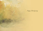 Inside of a Thanksgiving greeting card with soft watercolor autumn trees and 'Happy Thanksgiving' message.