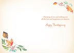 Inside of an autumnal watercolor greeting card displaying warm message 'Thinking of you and wishing you all the love and happiness you deserve. Happy Thanksgiving' with corner leaf accents.