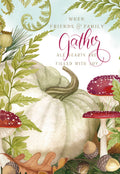 Front of a watercolor Thanksgiving card featuring a large white pumpkin, red toadstools, acorns, and green fern leaves. Script reads 'When friends & family gather, all hearts are filled with joy.' Perfect for autumn greetings.