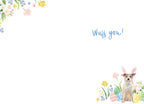 Inside view of an Easter greeting card with a minimalist design, featuring a small watercolor illustration of a dog with bunny ears, pastel eggs, and spring flowers in the bottom right corner. The card includes the playful handwritten message 'Wuff you!' in blue script on a white background, with additional floral accents in the top left corner.