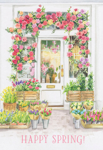 Watercolor illustration of a charming flower shop storefront adorned with vibrant pink and yellow roses, potted plants, and bouquets, 'Happy Spring!'.