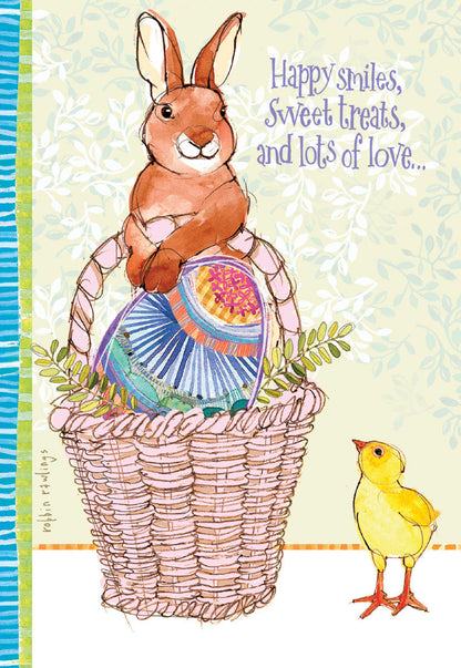 Front of a cute card featuring a watercolor brown bunny in a pink basket with a blue and purple patterned egg, a yellow chick, and text 'Happy smiles, Sweet treats, and lots of love...'