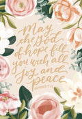 Greeting card front with floral border of pink, white, and orange flowers and green leaves on a peach background, featuring the scripture 'May the God of hope fill you with all joy and peace Romans 15:13' in elegant calligraphy for a blessed celebration.