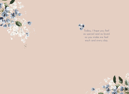 Inside of Mother's Day card with heartfelt message 'Today, I hope you feel as special and loved...' with floral accents.