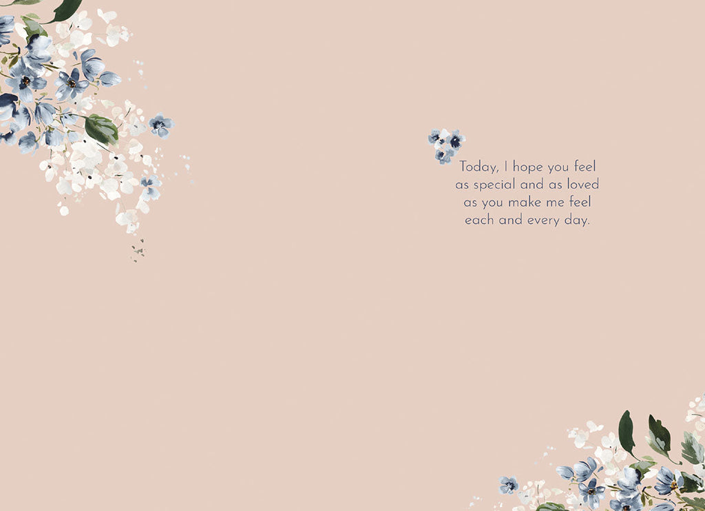 Open Mother's Day card interior showing a heartfelt message 'Today, I hope you feel as special and as loved as you make me feel each and every day.' surrounded by subtle floral accents on a blush background.