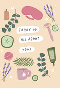 Front of a charming Mother's Day greeting card featuring a collection of spa and relaxation illustrations: a pink eye mask, lavender sprigs, cucumber slices, a rose quartz facial roller, a lit candle, a teacup, and various green botanicals. The central text reads 'TODAY is ALL ABOUT YOU!'. Ideal for pampering your mom.