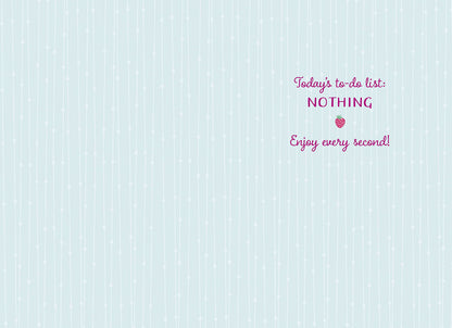 Inside of a light blue greeting card with text "Today's to-do list: NOTHING Enjoy every second!" and a small strawberry.