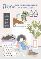 Cute Mother's Day greeting card featuring playful cats around a laundry machine, detergent, and laundry basket. Text says 'Mom, THANK YOU FOR ALWAYS MAKING SURE WE HAD CLEAN SOCKS.' Perfect for expressing heartfelt gratitude with humor.