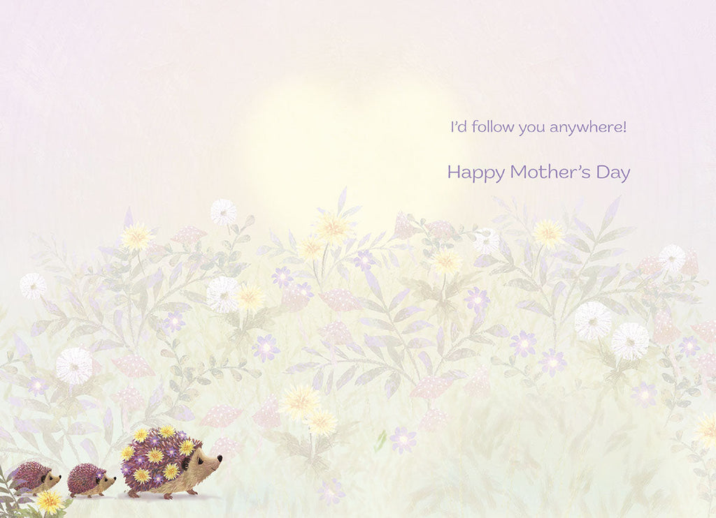 Inside a sweet Mother's Day greeting card showing the mother and baby hedgehogs at the bottom left with a faded floral background and the message 'I'd follow you anywhere! Happy Mother's Day'.