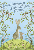 Charming Mother's Day greeting card featuring an adult bunny and a baby bunny on a green hill, framed by blossoming branches, with text 'Somebunny Loves You Mom' on a light blue background. Perfect for moms who love cute animal designs.