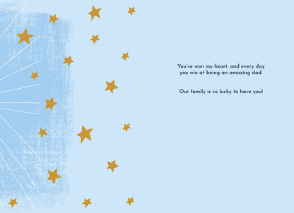 Inside of Father's Day card with stars, featuring the message: 'You've won my heart, and every day you win at being an amazing dad. Our family is so lucky to have you!'