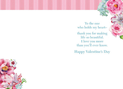Inside of a heartfelt floral greeting card with 'To the one who holds my heart...' message and corner accents.