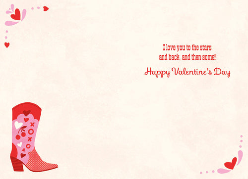Inside of a Valentine's Day greeting card with a small cowboy boot graphic on the left. The right side features the message 'I love you to the stars and back, and then some! Happy Valentine's Day' in red script.