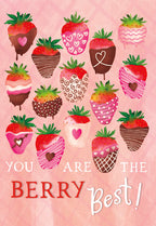 Close-up front view of a cute Valentine's greeting card featuring various chocolate-dipped strawberries with heart patterns on a pink background, with the sweet message 'You Are The Berry Best!'
