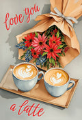 Front of a romantic greeting card featuring two coffee cups with heart latte art on a wooden tray, beside a vibrant bouquet of red and pink flowers with blue berries. The card reads 'love you a latte' in stylish red script.