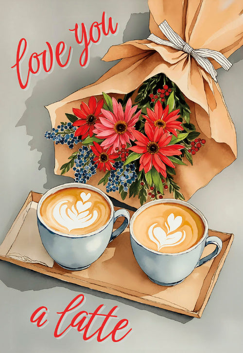 Front of a romantic greeting card featuring two coffee cups with heart latte art on a wooden tray, beside a vibrant bouquet of red and pink flowers with blue berries. The card reads 'love you a latte' in stylish red script.
