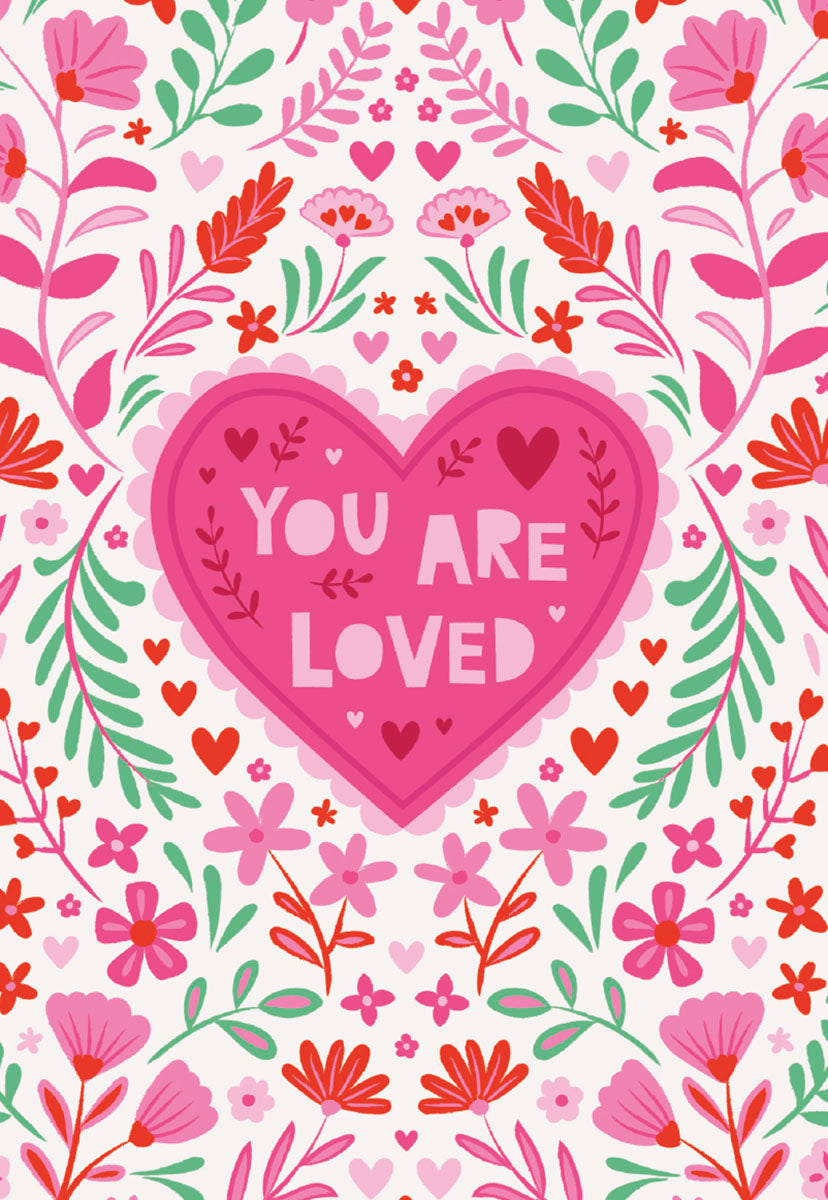 Vibrant floral greeting card for Valentine's Day featuring a central pink heart with 'YOU ARE LOVED' surrounded by pink, red, and green flowers and leaves on a white background, perfect for a friend or loved one.