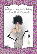 Funny greeting card featuring a stylish cartoon woman with a large afro, sunglasses, leopard print dress, and long black gloves, jokingly saying 'you still look the youngest', set against a purple leopard print background. Ideal for a female friend's birthday.
