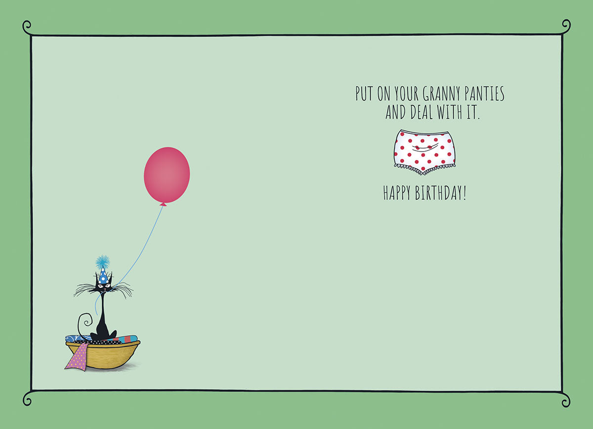 Humorous greeting card inside for her, displaying the text 'Put on your granny panties and deal with it. Happy Birthday!' alongside an illustration of polka dot underwear, a pink balloon, and a black cat in a laundry basket. Ideal for a sassy friend or grandparent.