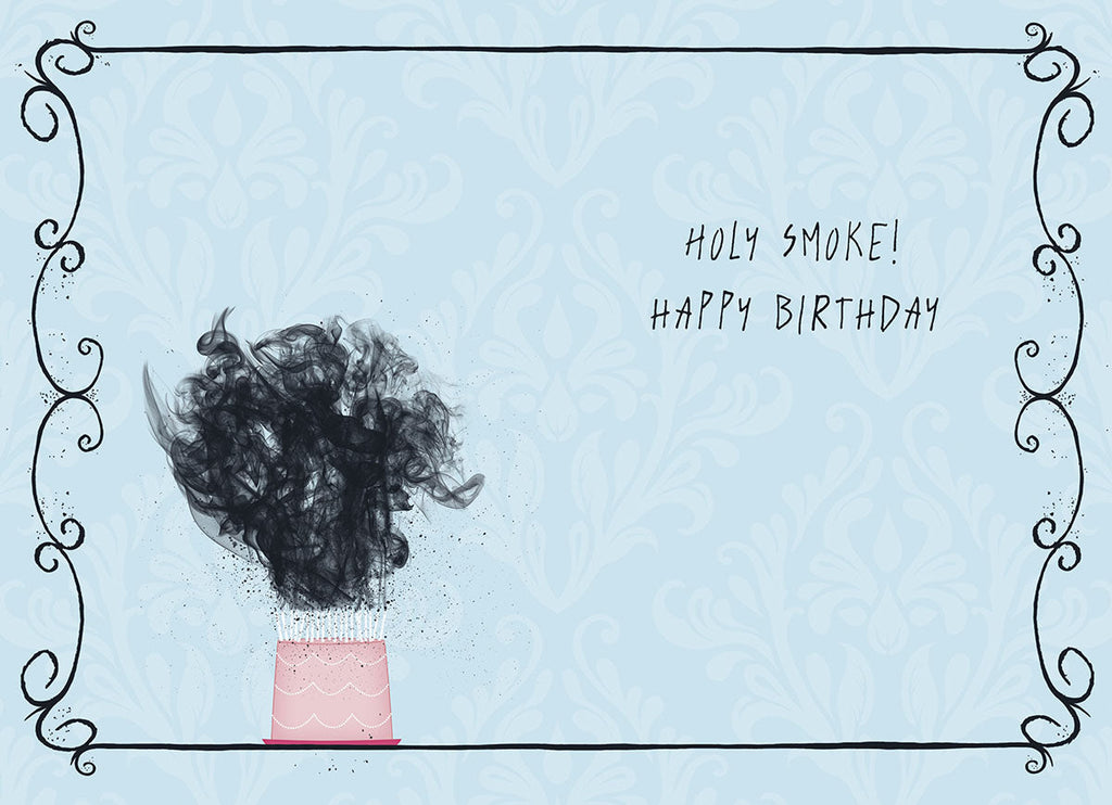 Inside of a funny birthday card with 'HOLY SMOKE! HAPPY BIRTHDAY' text. The left side shows the pink birthday cake with a huge cloud of black smoke, maintaining the humorous theme against a light blue damask background with a black decorative border.