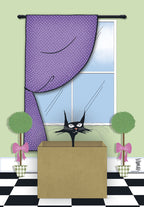 A humorous greeting card featuring a black cat with wide yellow eyes peeking out from a brown cardboard box. The setting is a whimsical indoor scene with light green walls, a window framed by long purple polka-dotted curtains, and two small topiary plants in decorative pots on a black and white checkered floor. The overall style is playful and artistic.