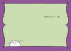 Inside of a greeting card with a whimsical purple ornate border and a light green background. A small peeking white cat smiles at the bottom, and the text 'THINKING OF YOU' is written at the top right, leaving ample space for a personal message.