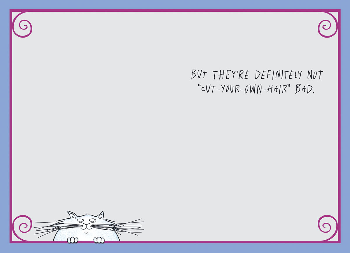 Inside of a funny encouragement greeting card featuring the humorous message 'BUT THEY'RE DEFINITELY NOT 'CUT-YOUR-OWN-HAIR' BAD.' with a small peeking cat illustration at the bottom.