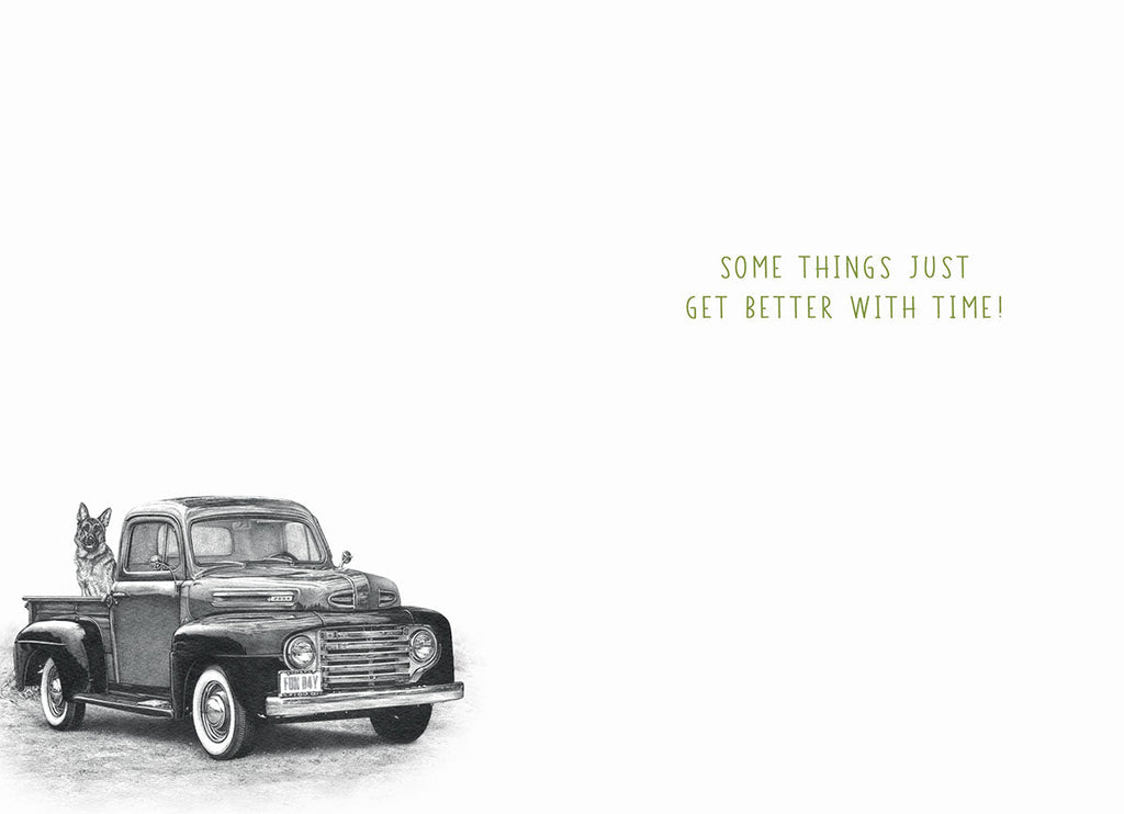 Inside view of a 'Wheely Great' birthday card, displaying a classic green pickup truck with a German Shepherd, accompanied by the heartfelt message 'Some things just get better with time!'.