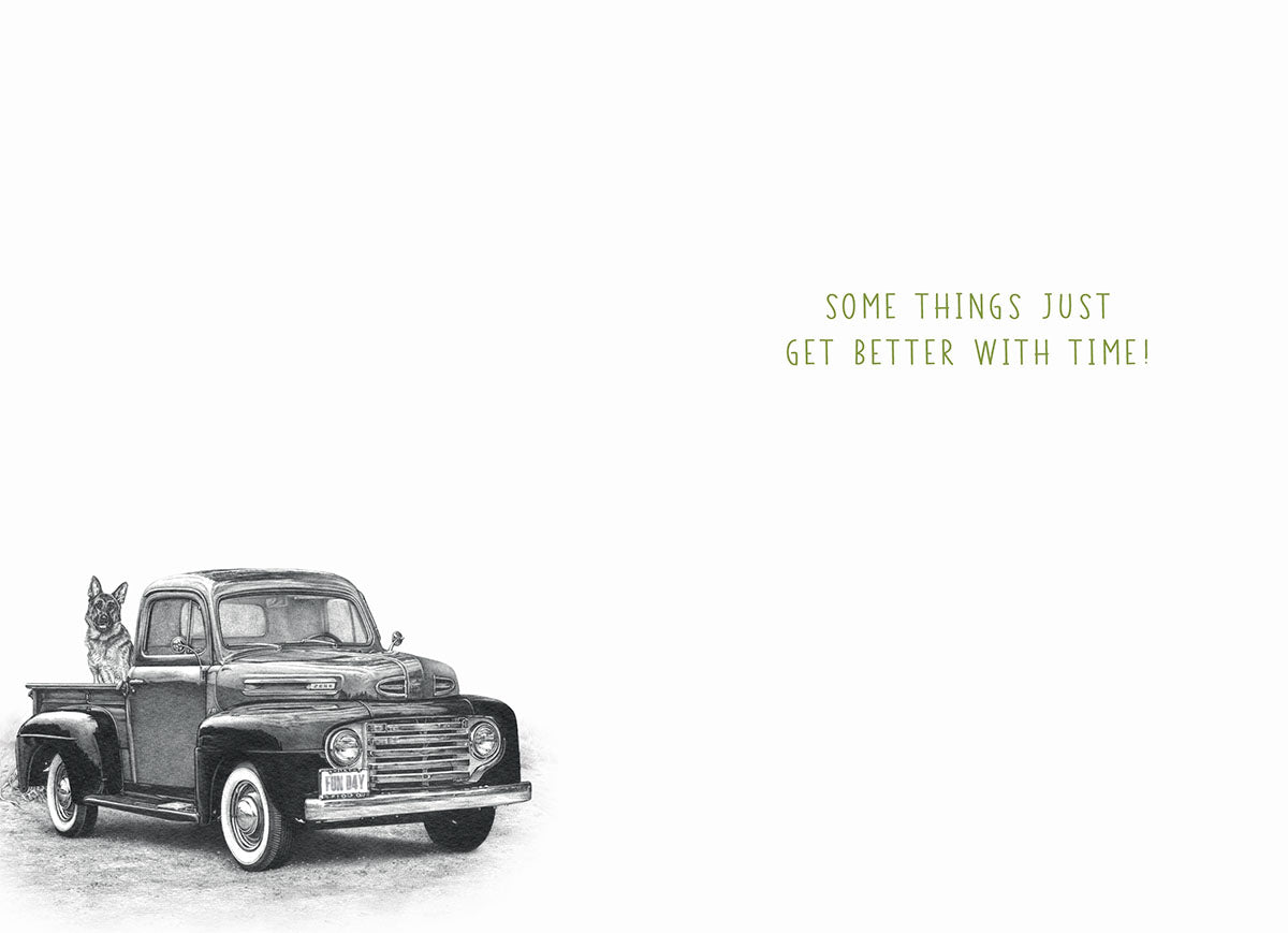 Inside view of a 'Wheely Great' birthday card, displaying a classic green pickup truck with a German Shepherd, accompanied by the heartfelt message 'Some things just get better with time!'.