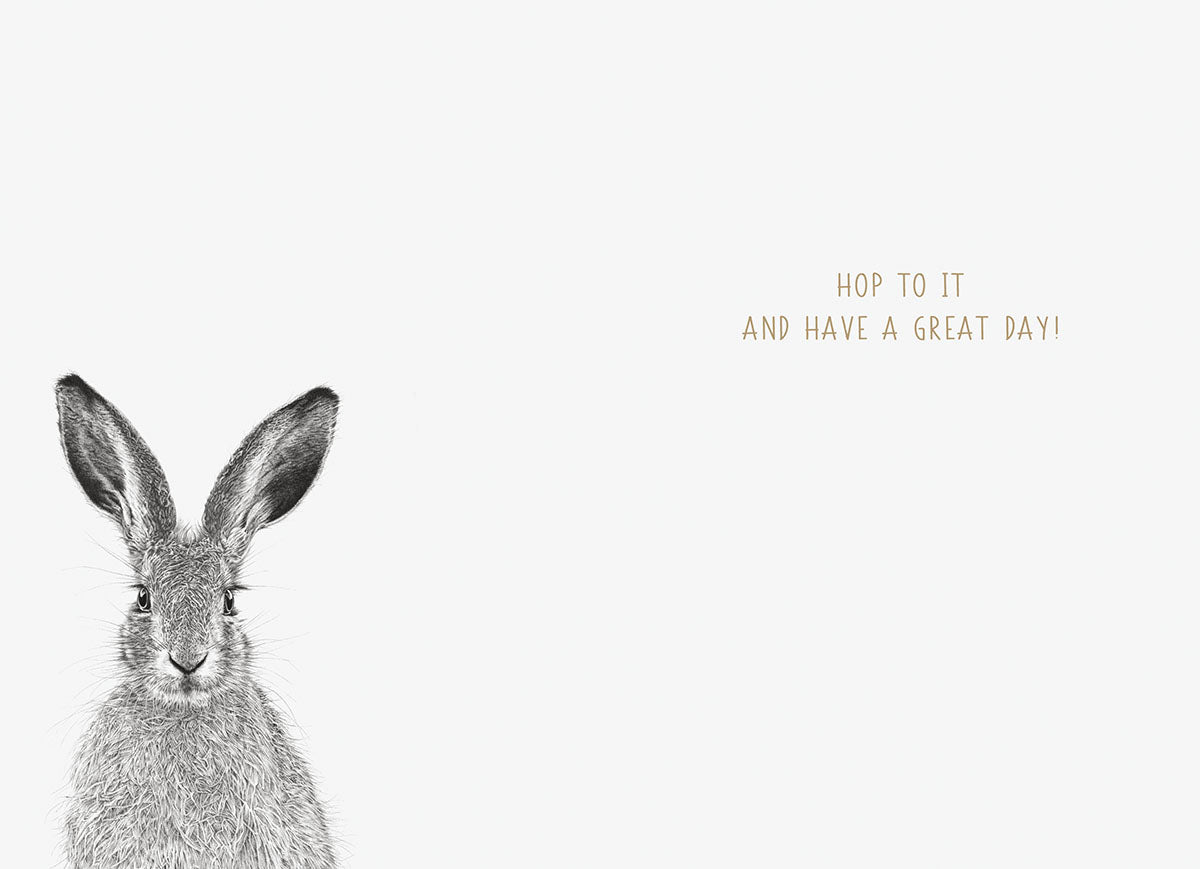 Interior of a greeting card featuring the left side of a brown hare with large ears on a light cream background, with gold text 'HOP TO IT AND HAVE A GREAT DAY!' to the right. Ideal for a playful message.