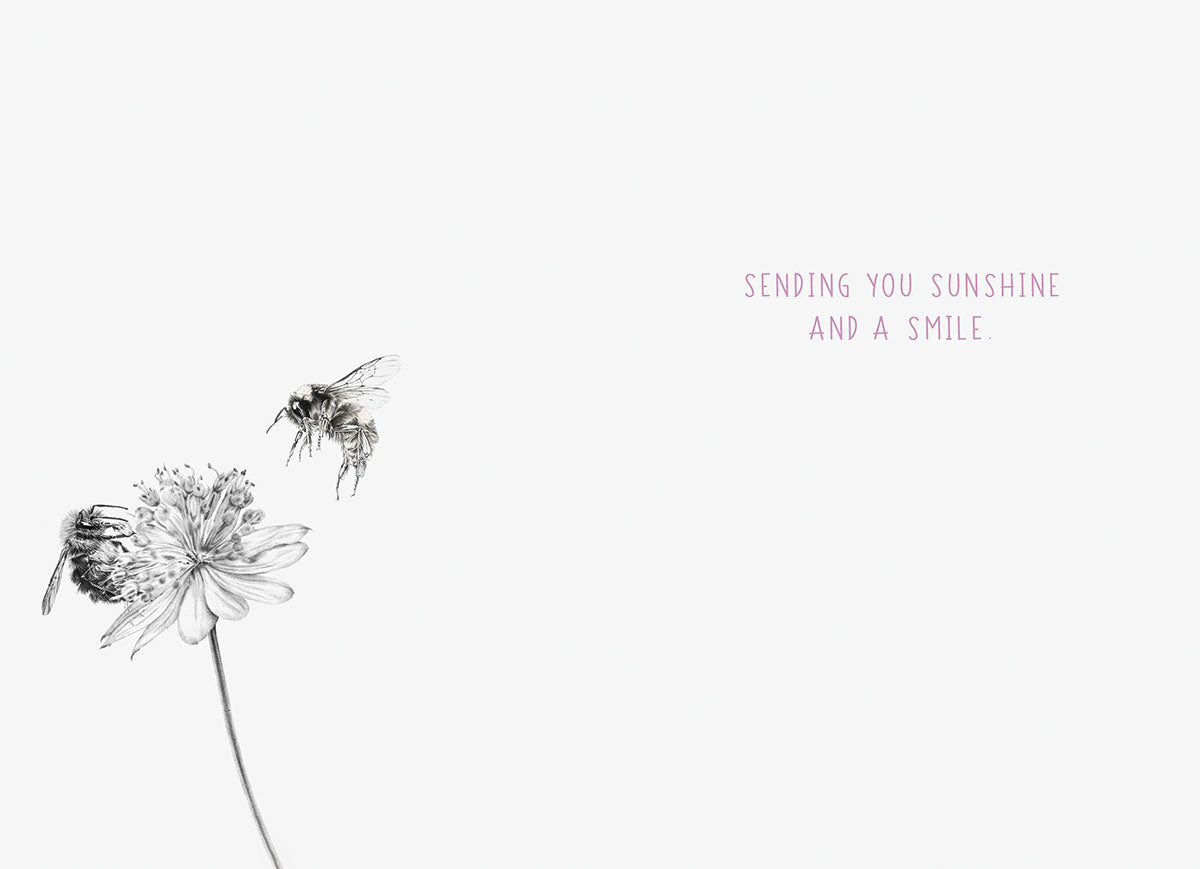 Inside view of a friendship greeting card with a grayscale bee and flower illustration, accompanied by the heartfelt message: 'SENDING YOU SUNSHINE AND A SMILE.'