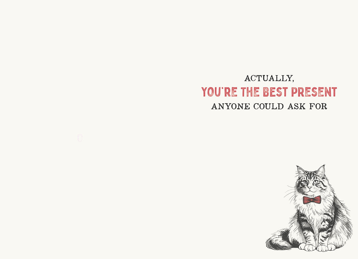 Inside of a sassy birthday card showing a small illustration of a tabby cat in a red bow tie with text 'ACTUALLY, YOU'RE THE BEST PRESENT ANYONE COULD ASK FOR'. Perfect for adding a personal, humorous touch to celebrations.