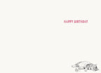 Inside of a humorous greeting card, light background with 'HAPPY BIRTHDAY' text at the top right and a small illustration of a sleeping tabby cat next to a cupcake wrapper at the bottom right, ready for a personalized message.