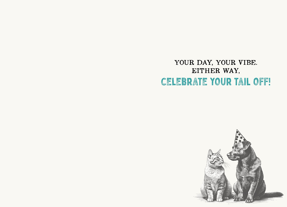 Inside of a humorous animal-themed greeting card with text 'Your Day, Your Vibe. Either Way, Celebrate Your Tail Off!' and small illustrations of a cat and dog.