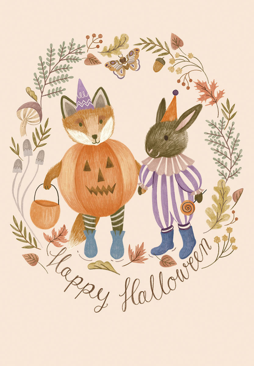 Cute autumn-themed greeting card featuring an anthropomorphic fox in a pumpkin costume and a rabbit in a striped harlequin outfit, holding hands, surrounded by fall foliage, mushrooms, and a butterfly, with 'Happy Halloween' calligraphy.