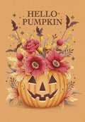 Greeting card front featuring a smiling jack-o'-lantern adorned with vibrant red and yellow flowers, autumn leaves, and glittery bats on a warm orange background. Text: HELLO PUMPKIN.