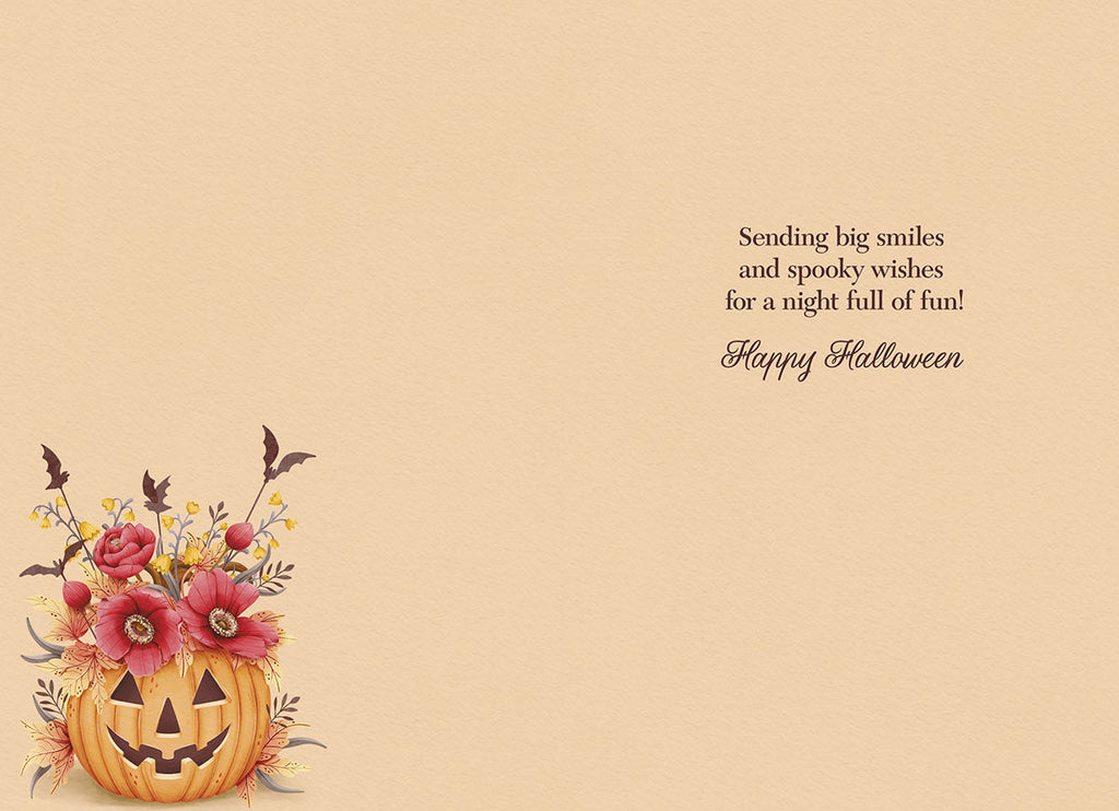Inside of a spooky season card with a smaller floral pumpkin illustration on the bottom left and a friendly message on the right: 'Sending big smiles and spooky wishes for a night full of fun! Happy Halloween'.