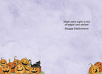 Inside of a cute Halloween greeting card with a light purple background, featuring the message 'Hope your night is full of magic and smiles! Happy Halloween' alongside a border of smiling pumpkins and a black cat illustration.