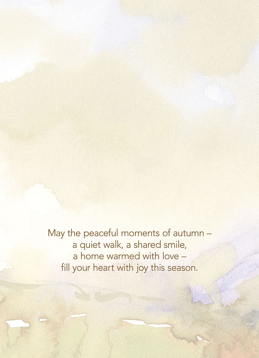 Inside of a watercolor Thanksgiving card with a serene autumn background, displaying the heartfelt message: "May the peaceful moments of autumn – a quiet walk, a shared smile, a home warmed with love – fill your heart with joy this season."