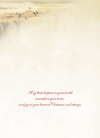 SEO-optimized alt text: Interior of a heartfelt holiday greeting card, showing elegant red script on a warm cream background. The message reads: 'May there be peace in your world, warmth in your home, and joy in your heart at Christmas and always.'