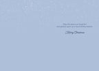 Interior of a holiday greeting card with a light blue background and a heartfelt message wishing peace for the recipient during the season.