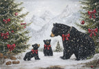 Black bear family greeting card, festive forest scene with cubs, snowy mountains, and decorated evergreen trees with red bows and ornaments.