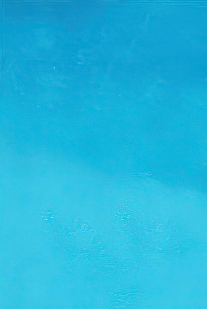 Solid light blue background of a blank greeting card inside.