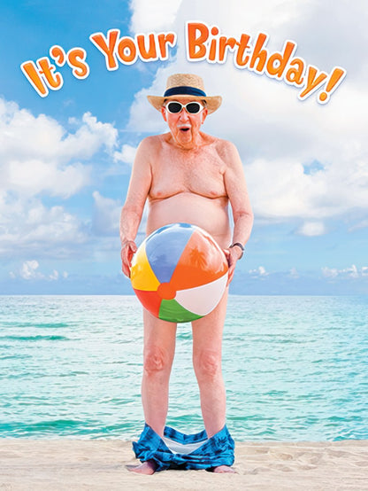 Funny birthday card featuring an older man in a straw hat and sunglasses, seemingly naked holding a beach ball, on a sunny beach.