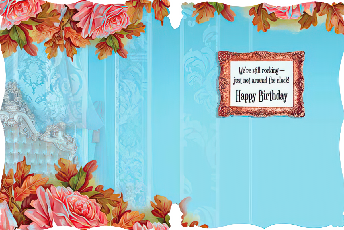 Inside of a humorous birthday card featuring a framed message 'We're still rocking — just not around the clock! Happy Birthday' against a pale blue background with rose and leaf borders.