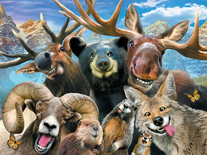 A group of smiling wild animals including a moose, bear, coyote, ram, beaver, and squirrel, set against a mountain backdrop.