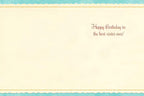 Inside of a sentimental birthday card for a sister. The cream-colored interior features elegant dotted and scalloped borders, with the message 'Happy Birthday to the best sister ever!' printed in a decorative font.
