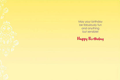 Inside of a greeting card with a yellow background and white damask pattern, reading: 'May your birthday be fabulously fun and anything but sensible! Happy Birthday'