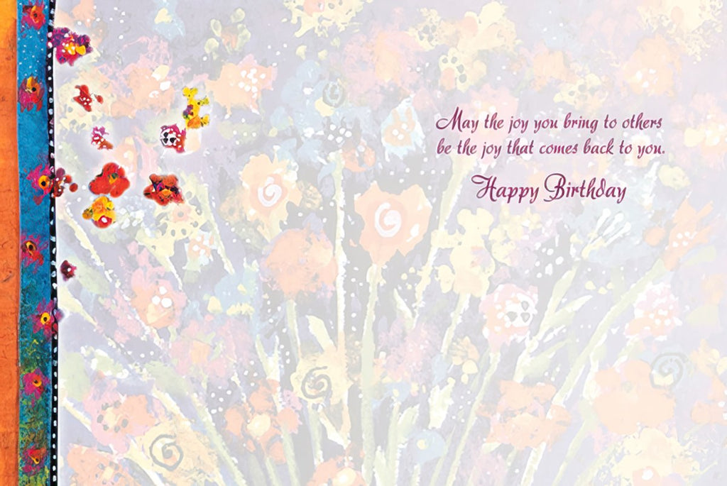 Inside of a heartfelt friend greeting card with a delicate floral background and an inspiring message: 'May the joy you bring to others be the joy that comes back to you. Happy Birthday'.